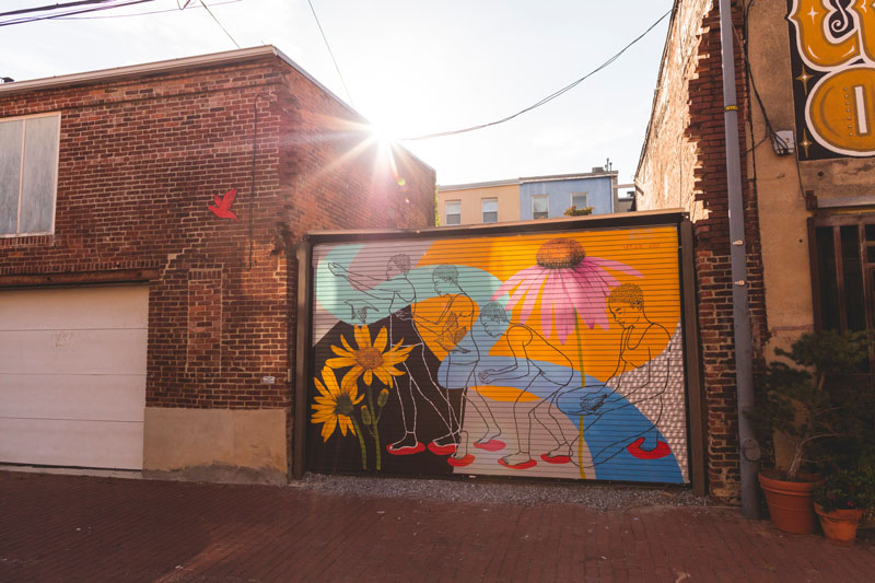 Mural de arte callejero "Let Go" en Blagden Alley - Barrio Shaw en Washington, DC