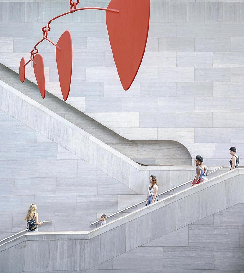 @pootie_ting - Visitors on stairs at the National Gallery of Art East Building - Free modern art museum in Washington, DC