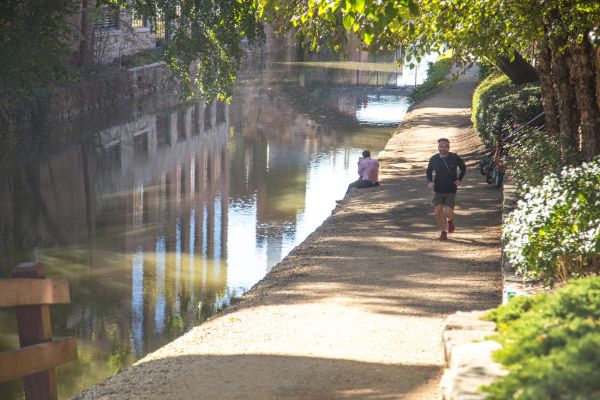 Person running along the C&O Canal