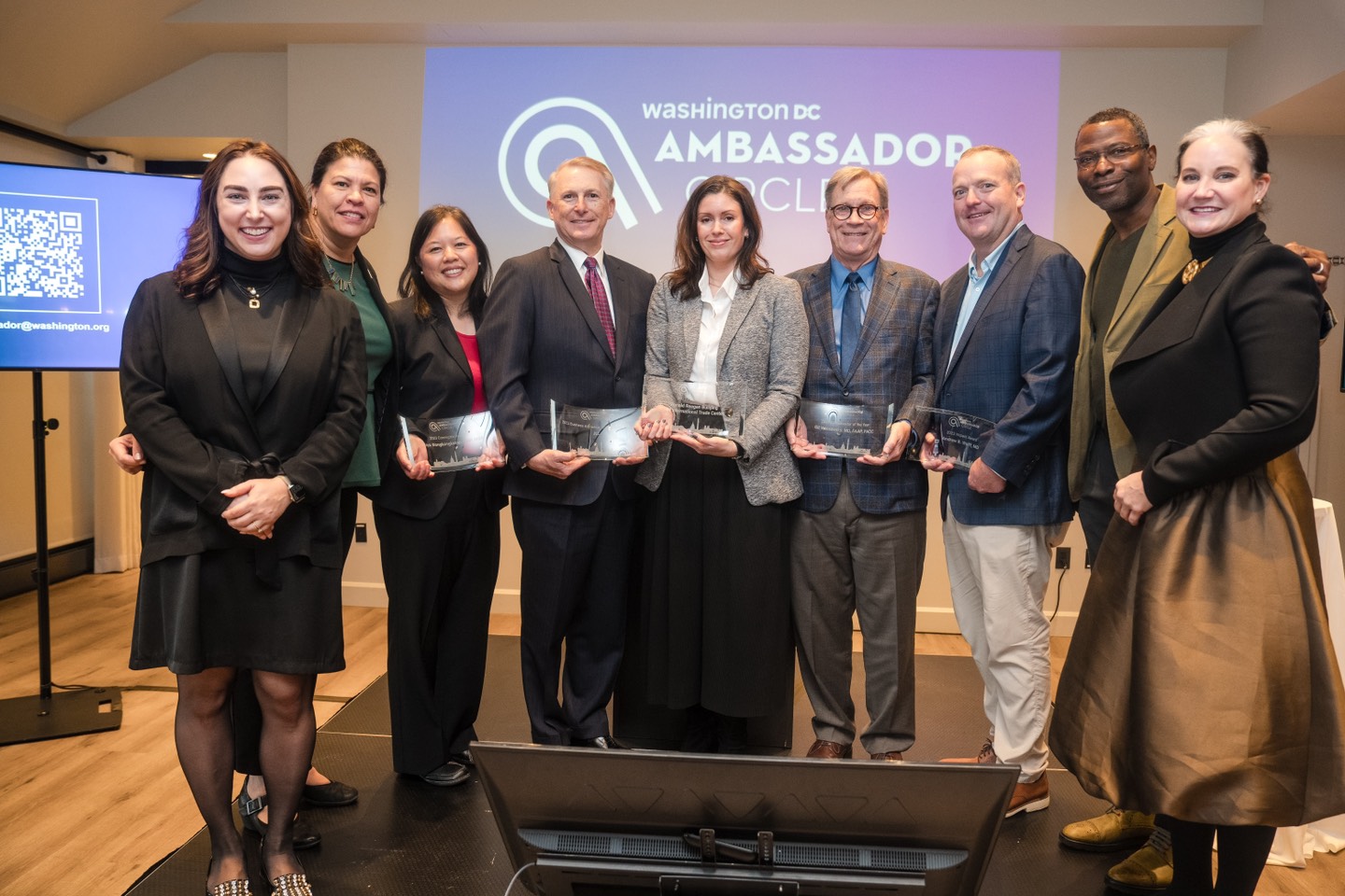 Vencedores do Prêmio Ambassador Circle 2023 e equipe do DDC