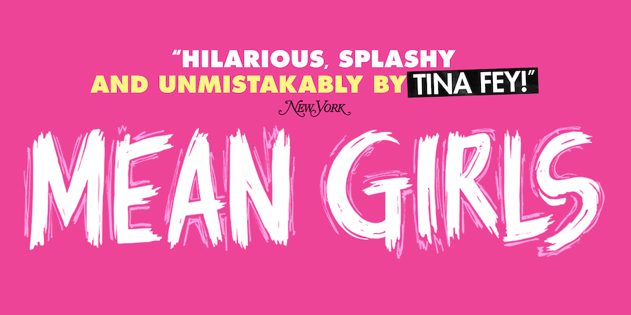 A bright pink poster for the 'Mean Girls' musical, featuring the text 'Hilarious, Splashy and Unmistakably by Tina Fey!' from New York Magazine, with the title 'Mean Girls' in bold white letters.