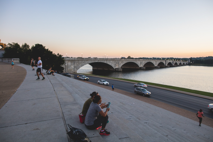 People sitting on the Watergate Steps 