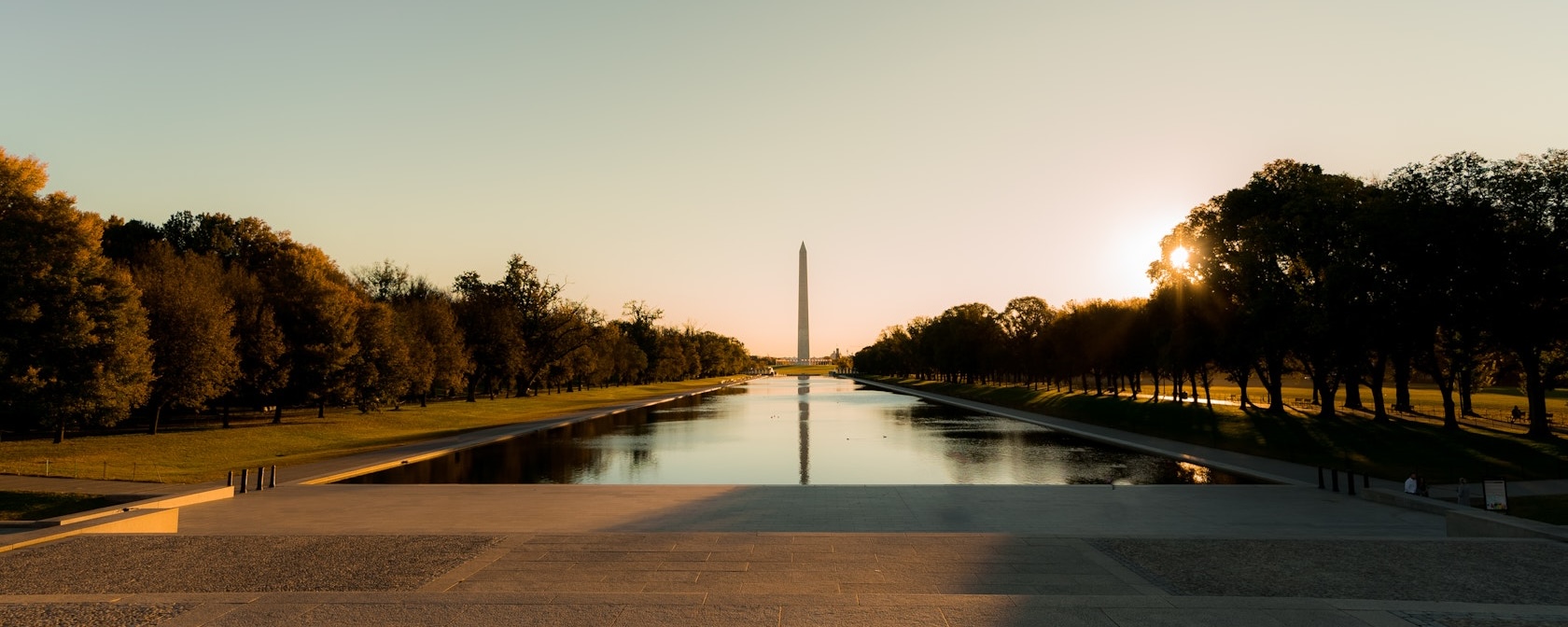 An evening view of the Reflecting Pool, with the Washington Monument in the distance. 