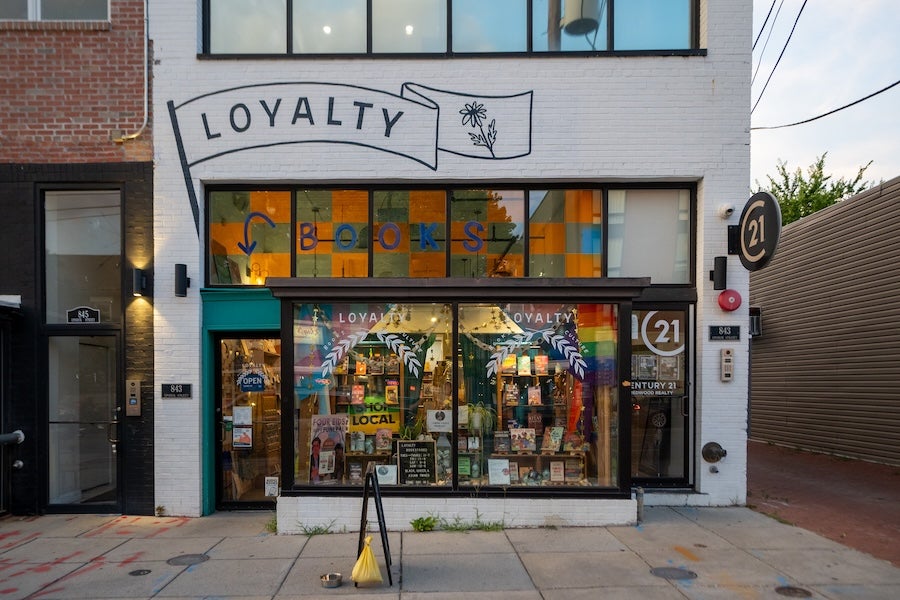 Exterior of Loyalty Bookstore, an independent neighborhood bookshop with a colorful storefront in Washington, DC.