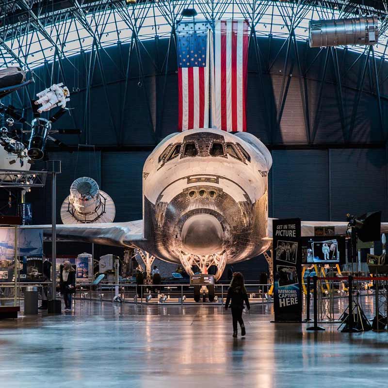 @abroadwife - Child standing in front of Space Shuttle Discovery at the Udvar-Hazy Air and Space Museum - Free Smithsonian museum near Washington, DC