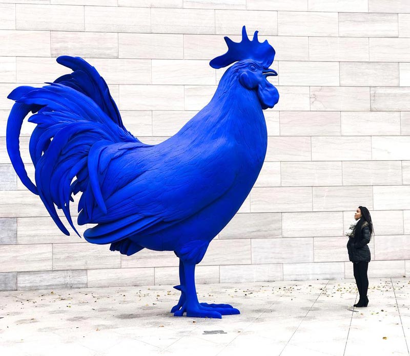 @candycalderon_ - Woman with Katharina Fritsch's Hahn/Cock sculpture at the National Gallery of Art - Most Instagrammable spots in Washington, DC