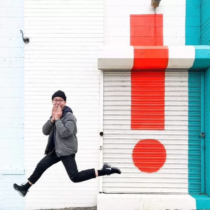 @xoxoxoxooxoxoxox - Man jumping in front of street mural in Washington, DC's Union Market District NoMa neighborhood
