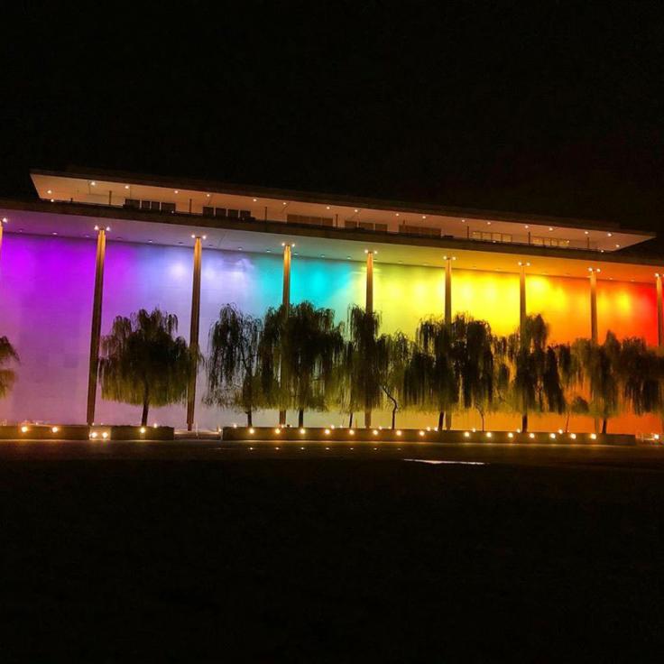 Kennedy Center illuminated by rainbow lights