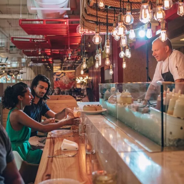 Couple dining at Jose Andres' China Chilcano in Penn Quarter DC - Bib Gourmand restaurants in Washington, DC