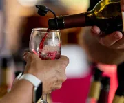 Wine pouring into glass at Mount Vernon Fall Wine Festival