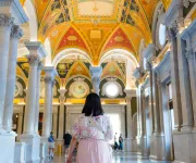 Person standing inside the Library Of Congress