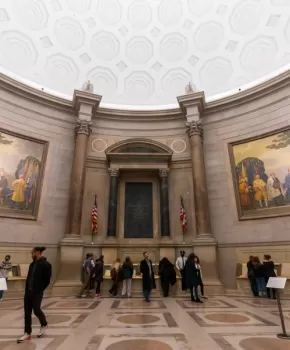 People gathering inside the National Archives
