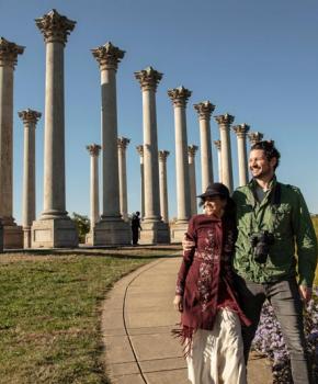 Couple walking by the National Capitol Columns at the National Arboretum - Public park and attraction in Washington, DC