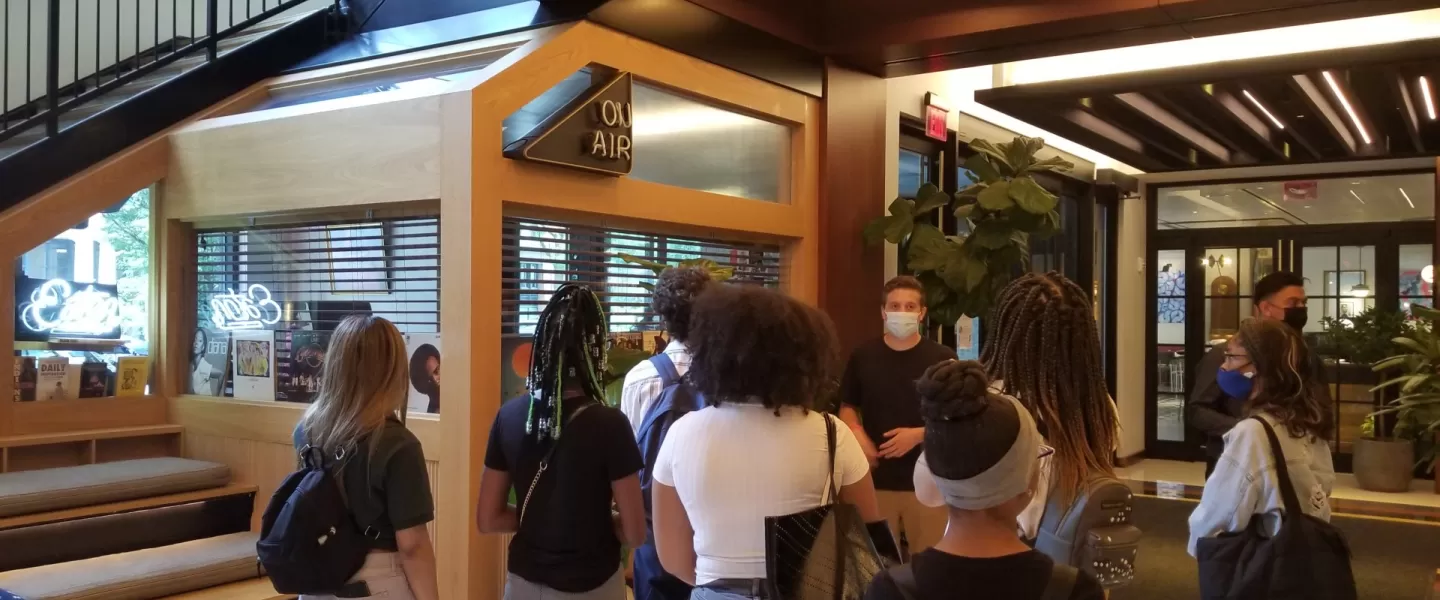 AEF interns listen to a tour of the Eaton Hotel 