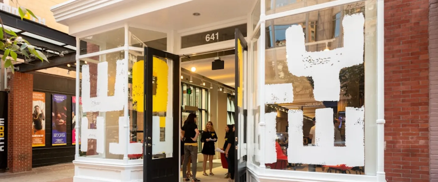 The exterior of Woolly Mammoth Theatre Company in Washington, DC with it doors open. 