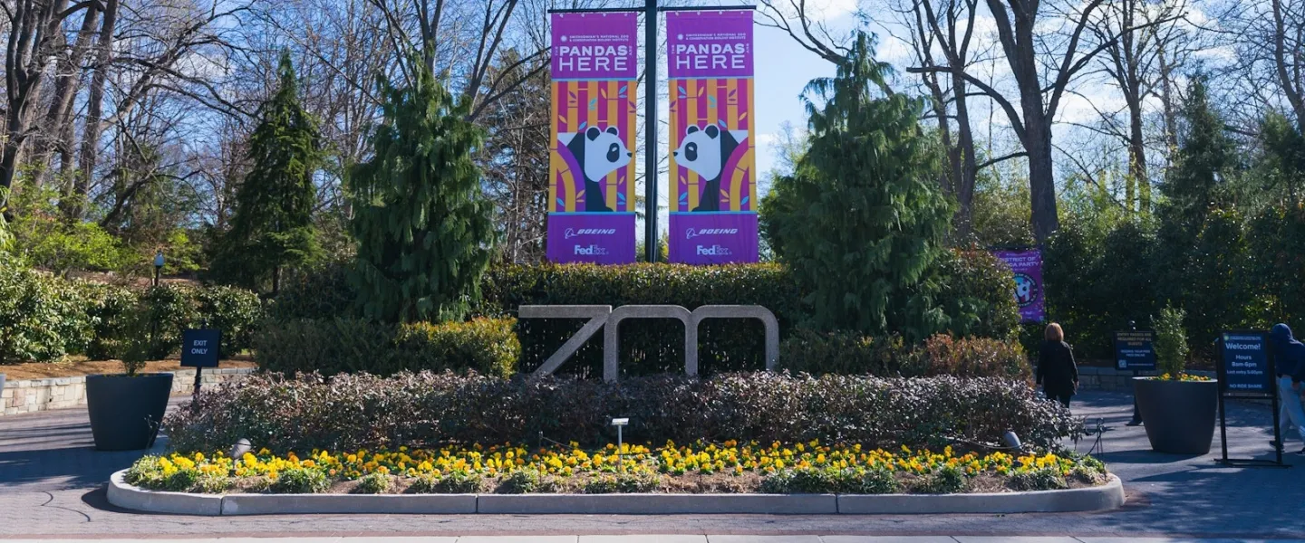 Entrance to the Smithsonian National Zoo with banners announcing pandas.