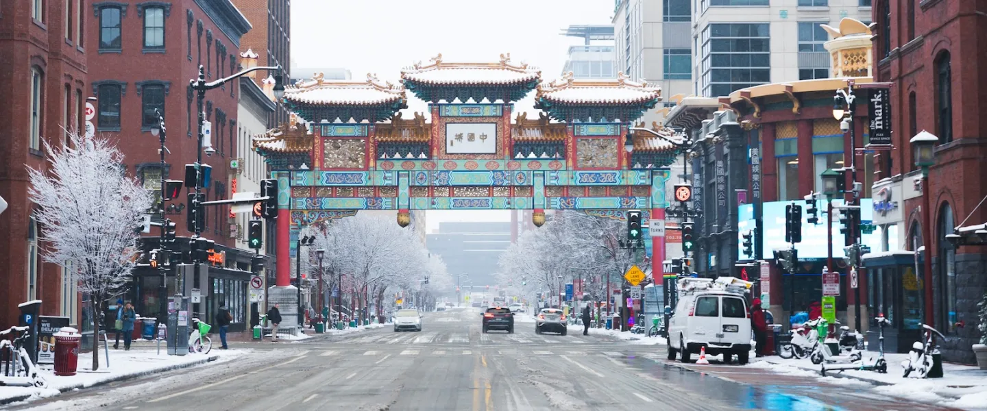 A view of the Chinatown Arch in Washington, DC on a snowy day. 
