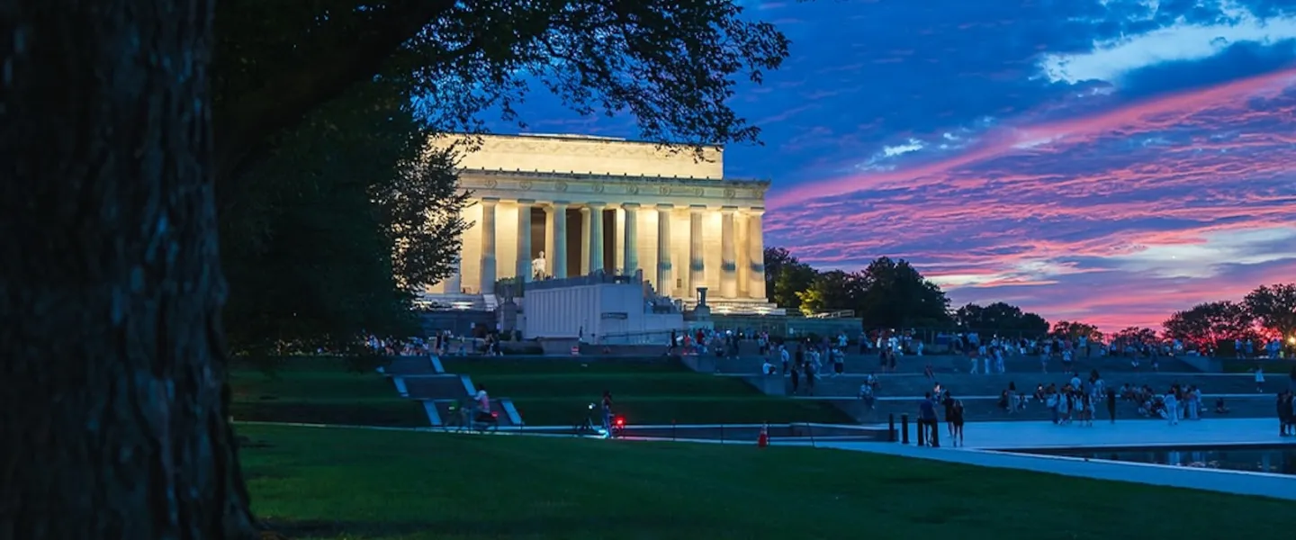 A view of the Lincoln Memorial from afar on a summer night.