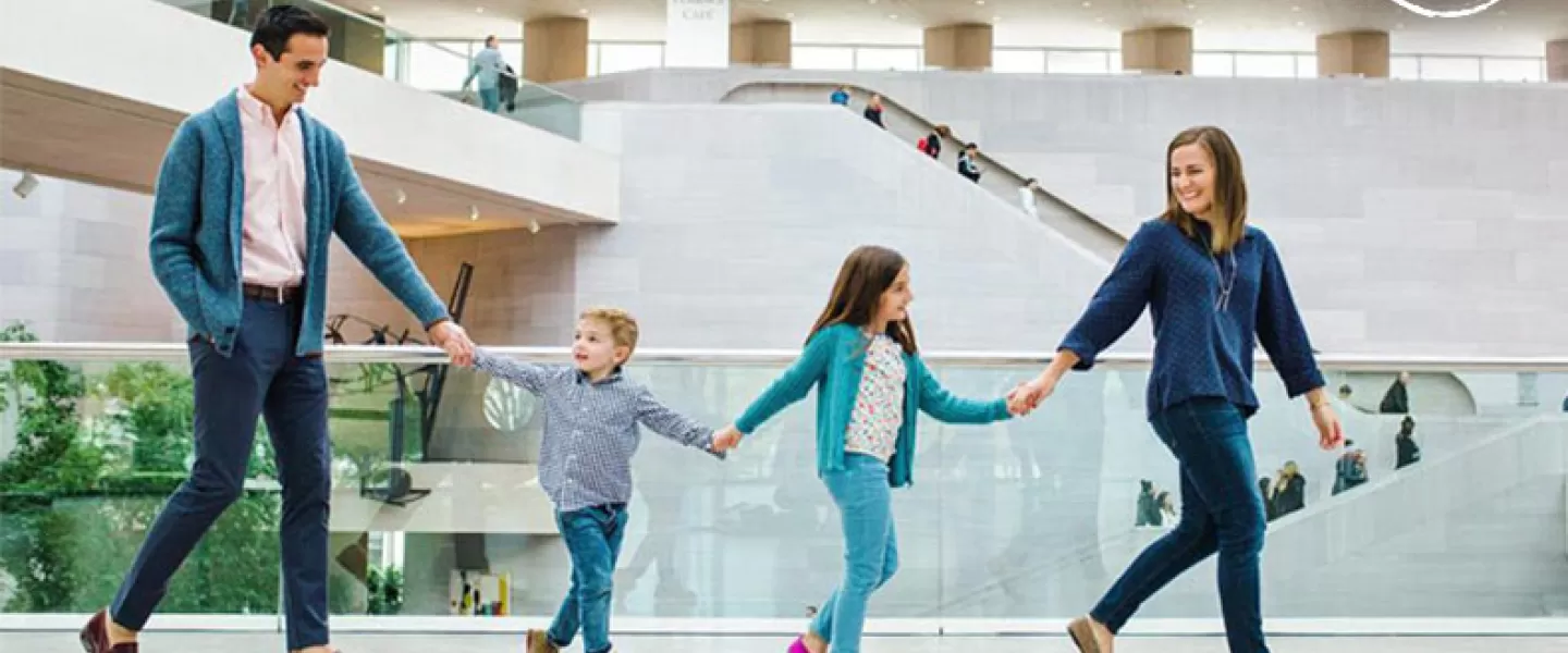 Free museum experiences in Washington, DC - Family at the National Gallery of Art East Building on the National Mall