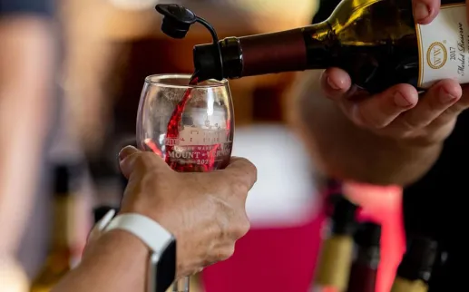 Wine pouring into glass at Mount Vernon Fall Wine Festival