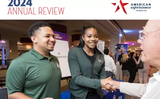 AEF 2024 Annual Review cover - A young Black man and a young Black woman shake hands with a professional off camera