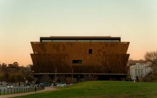 The National Museum of African American History and Culture in Washington, DC, at sunset.