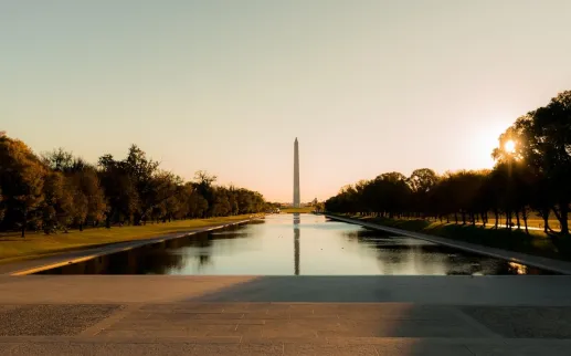 An evening view of the Reflecting Pool, with the Washington Monument in the distance. 
