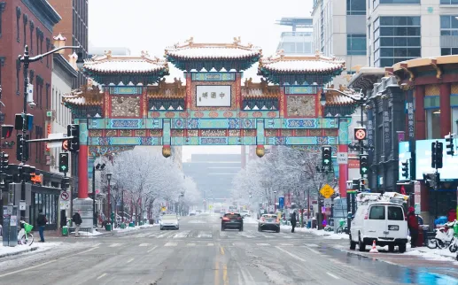 A view of the Chinatown Arch in Washington, DC on a snowy day. 