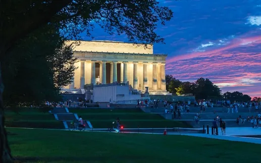 A view of the Lincoln Memorial from afar on a summer night.