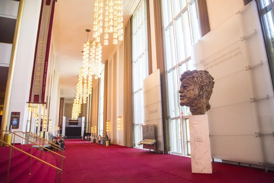 Kennedy Center with red carpet and JFK head