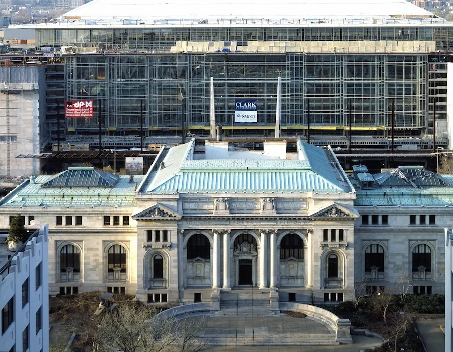 The historic Carnegie Library in Washington, DC, with the new convention center under construction behind it.