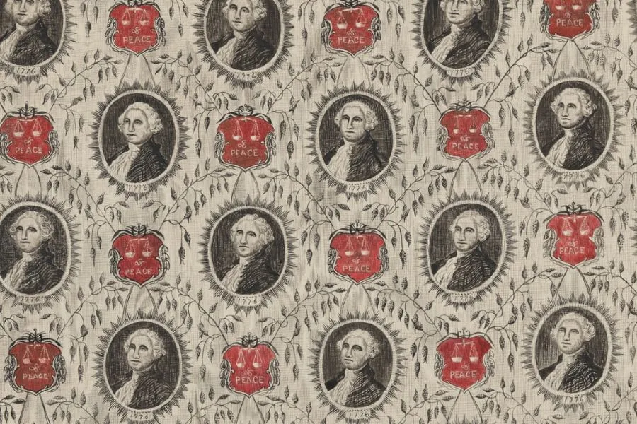 Decorative textile pattern featuring repeated portraits of George Washington surrounded by floral motifs and red emblems labeled “Peace” and dated 1776.