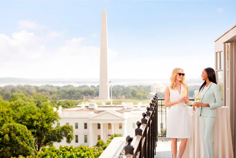 Guests at Top of the Hay rooftop at The Hay-Adams hotel - Luxurious and fancy date ideas in Washington, DC