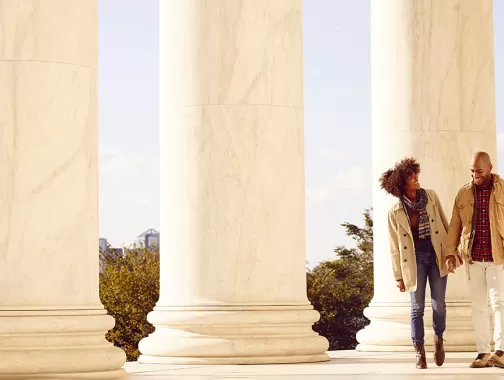 Couple strolling at Jefferson Memorial