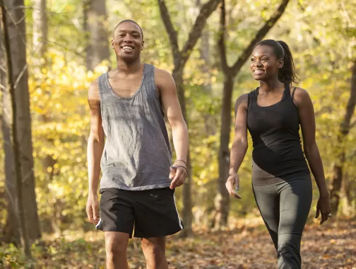 Couple walking in Rock Creek Park