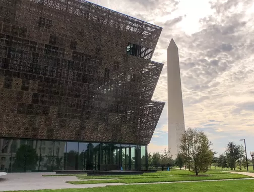National Museum of African American History and Culture on the National Mall with Washington Monument