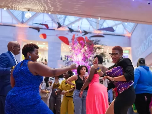 Guests dance and celebrate during a lively event at the National Gallery of Art in Washington, DC.
